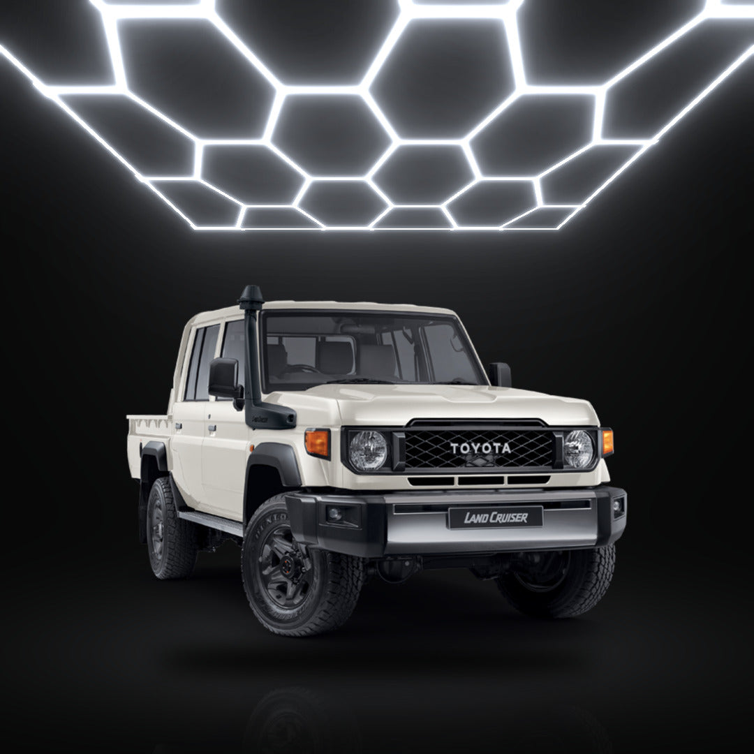 Toyota Land Cruiser 79 under hexagon garage lights